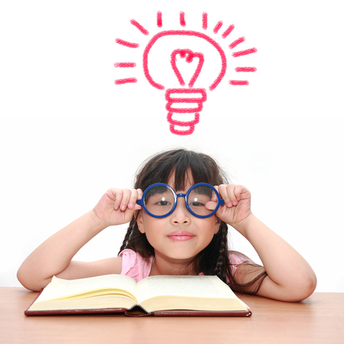 little girl with glasses and lightbulb